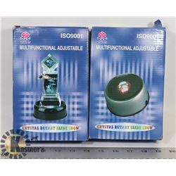 PAIR OF CRYSTAL ROTARY SLIDE SHOW BASES