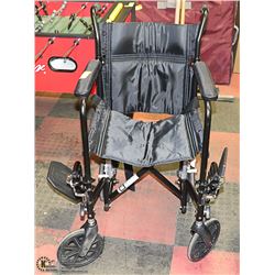TRANSPORT WHEELCHAIR