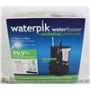 Image 1 : WATERPICK WATERFLOSSER + OSCILLATING TOOTHBRUSH