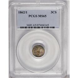 1862/1 3CS MS65 PCGS. The telltale spike from the base 