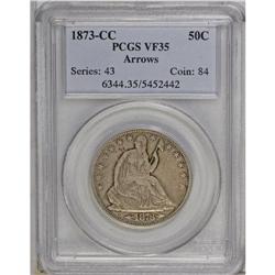 1873-CC 50C Arrows VF35 PCGS. Moderate wear is evident 