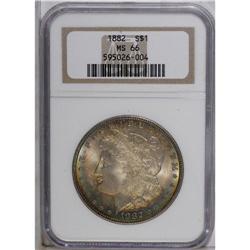 1882 S$1 MS66 NGC. Peach, sky-blue, radish-red, and pl 