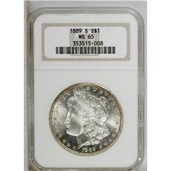 1889-S S$1 MS65 NGC. Golden-brown and blue-green tonin 