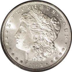 1892 S$1 MS65 Prooflike PCGS. Housed in an older green 