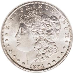 1894 S$1 AU58 NGC. The barest glimpses of gold lie ove 