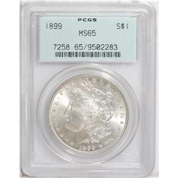 1899 S$1 MS65 PCGS. Attractive golden-brown shades vis 