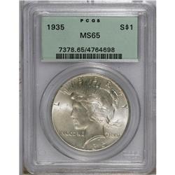 1935 S$1 MS65 PCGS. A highly lustrous piece with milky 