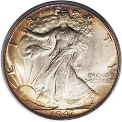 1947 50C MS67 PCGS. Rich rainbow toning is seen near t 