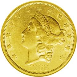 1868-S $20 AU55 NGC. This coin is an appealing yellow- 