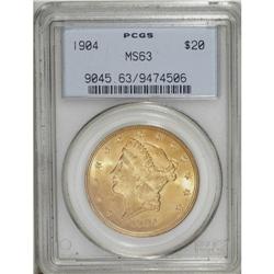 1904 $20 MS63 PCGS. This lustrous lemon-gold type coin 