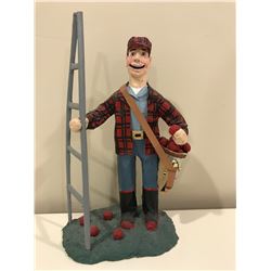 Apple picking man figurine