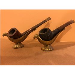 2 pipes with holders