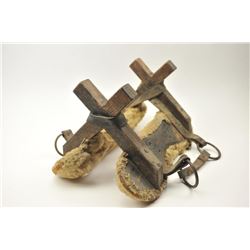 Antique wood and leather pack saddle with sheepskin liner in good overall condition. The pack sad