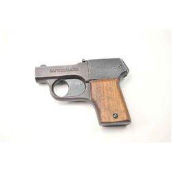 O.F. Mossberg Brownie four shot pepperbox derringer, .22 caliber, Serial #12296. The pistol is in