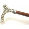 Image 3 : Exotic Snakewood cane with an art nouveau  silver grip, 36” in overall length.  Est.:   $175-$350.