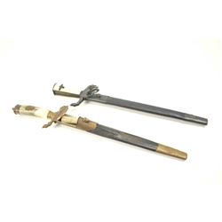 Lot of 2 reproduction German hunting swords from the Nazi era. An excellent copy with bone grips