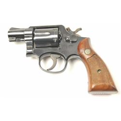 Smith & Wesson Model 10-5 Double Action Revolver in .38 Special caliber with blue finish, and chec