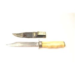 Silver mounted California belt knife with characteristic belt hook on scabbard and finger grooved