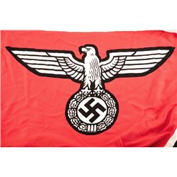 World War II era Nazi marked naval flag. The flag is approximately 12’ x 6’ with the German eagle