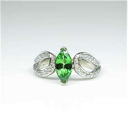 Lovely Contemporary Style Tsavorite Garnet and Diamond Ring featuring a Marquise cut Tsavorite wei