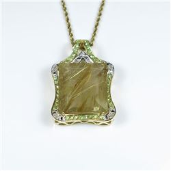 Incredible Huge Rutile Quartz, Tsavorite and Diamond Pendant featuring an emerald cut Rutile Quart