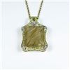 Image 1 : Incredible Huge Rutile Quartz, Tsavorite and  Diamond Pendant featuring an emerald cut  Rutile Quart
