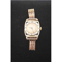 Rare Longines Wristwatch, 2 color 14K white & rose gold, enamel bezel, circa late 1930's-early 194