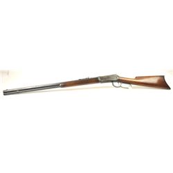 Winchester Model 1894 lever action rifle with a 26” octagon barrel, .32-40 caliber, full magazine,
