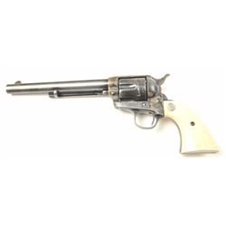 Colt SAA Revolver in .38-40 caliber with a 7 ½” barrel, blue and case hardened finish, and carved