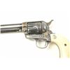 Image 3 : Colt SAA Revolver in .38-40 caliber with a 7  ½” barrel, blue and case hardened finish, and  carved