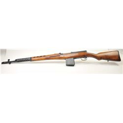 Russian Tokarev SVT-40 semi-automatic rifle, 7.62 x 54R caliber, Serial #91454. The rifle is in f