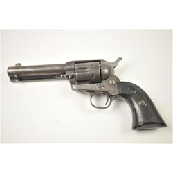 Colt Single Action Army Revolver in .38-40 caliber with a 4 ¾” barrel, patina finish, and hard rub