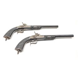 Pair of mid-19th century percussion Dueling/Target pistols with fined carved ebony stocks, blue an