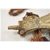 Image 2 : Jägermeister’s flask constructed from  shoulder bones of oxen and completely carved  in ancient scen