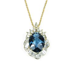 Dazzling Fine London Blue Topaz and Diamond Pendant featuring an oval checkerboard cut Topaz weigh
