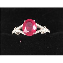 One beautifully designed ruby diamond ring made in 18k white gold containing 2,25ct oval ruby and