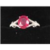 Image 1 : One beautifully designed ruby diamond ring  made in 18k white gold containing 2,25ct oval  ruby and 