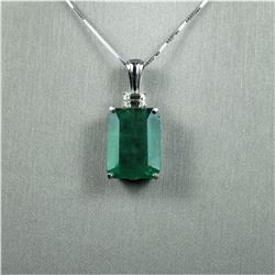 Magnificent 22.67 carat GIA Certified Natural Emerald perfectly accented with a 0.72 carat emerald