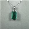 Image 1 : Magnificent 22.67 carat GIA Certified Natural  Emerald perfectly accented with a 0.72 carat  emerald