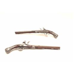 Pair of Gio Bonazo Italian high art flintlock pistols with fantastic high art chiseled steel decor