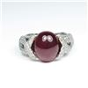 Image 1 : Glamorous Cabochon Ruby and Diamond Ring  featuring an approx. 10.00 carat Ruby  accented with over 