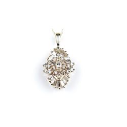 Beautiful Extra Fine Vintage Diamond Pendant featuring a Marquise cut center Diamond surrounded by