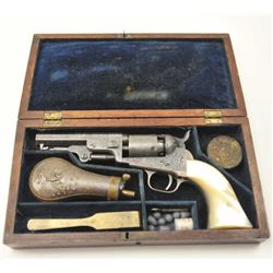 Colt 1849 Pocket Model Percussion revolver in .31 caliber showing fully and finely deluxe engravin