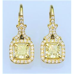 Elegant Fancy Yellow and White Diamond  Earrings featuring two matching Radiant Cut  Diamonds weighi