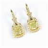 Image 2 : Elegant Fancy Yellow and White Diamond  Earrings featuring two matching Radiant Cut  Diamonds weighi