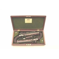 Pair of John Manton flintlock dueling pistols in case with accessories. Measures 15 ½” overall wit