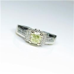 Brilliant Fancy Yellow and White Diamond Ring  featuring a cushion cut light Fancy Yellow  Diamond w