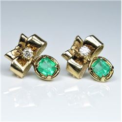 Gorgeous Vintage Emerald and Diamond Earrings featuring two matching Colombian Emeralds weighing a