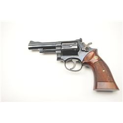 Smith & Wesson 19-3 Double Action Revolver with a 4” pinned barrel, target grips and hammer, 7K266