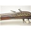 Image 17 : Early Germanic full stock musket with a full  stock and brass hardware.  The lock shows a  curved ba